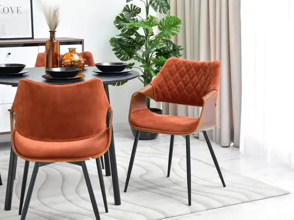 Welurowe krzesło w miedzianym obiciu - ideale do Twojego domu